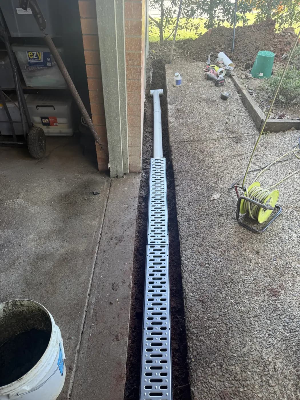 Channel drain cut into the path - after