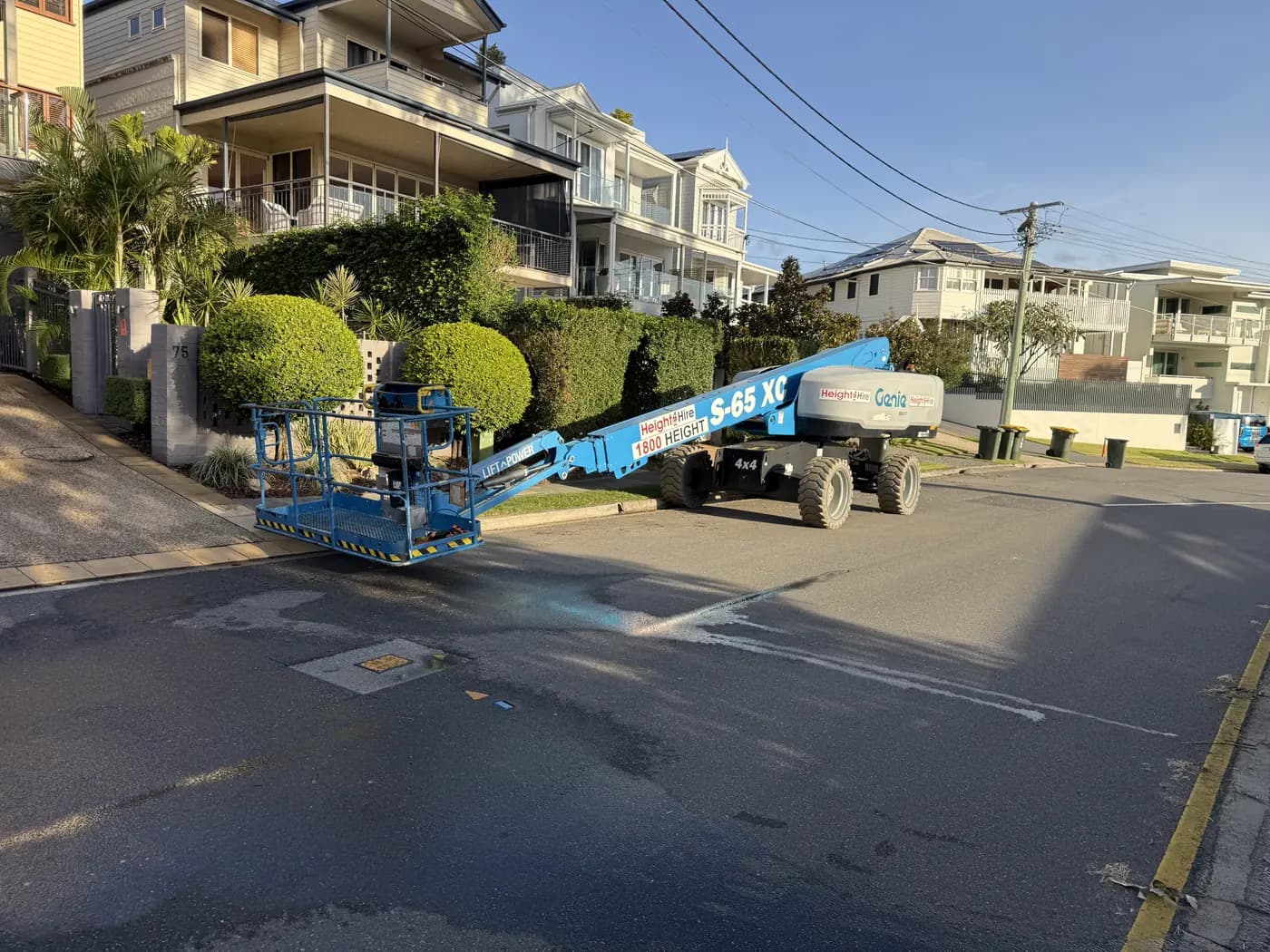 Rusted gutters replaced, up the boom lift - after