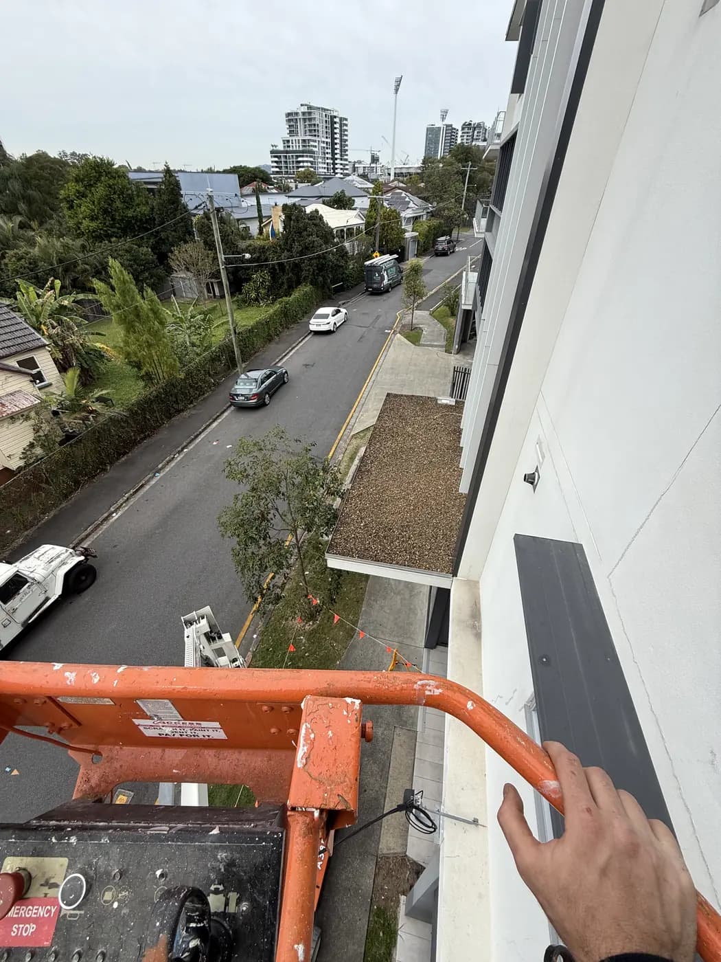 Apartment block roof leak, up the boom lift - after