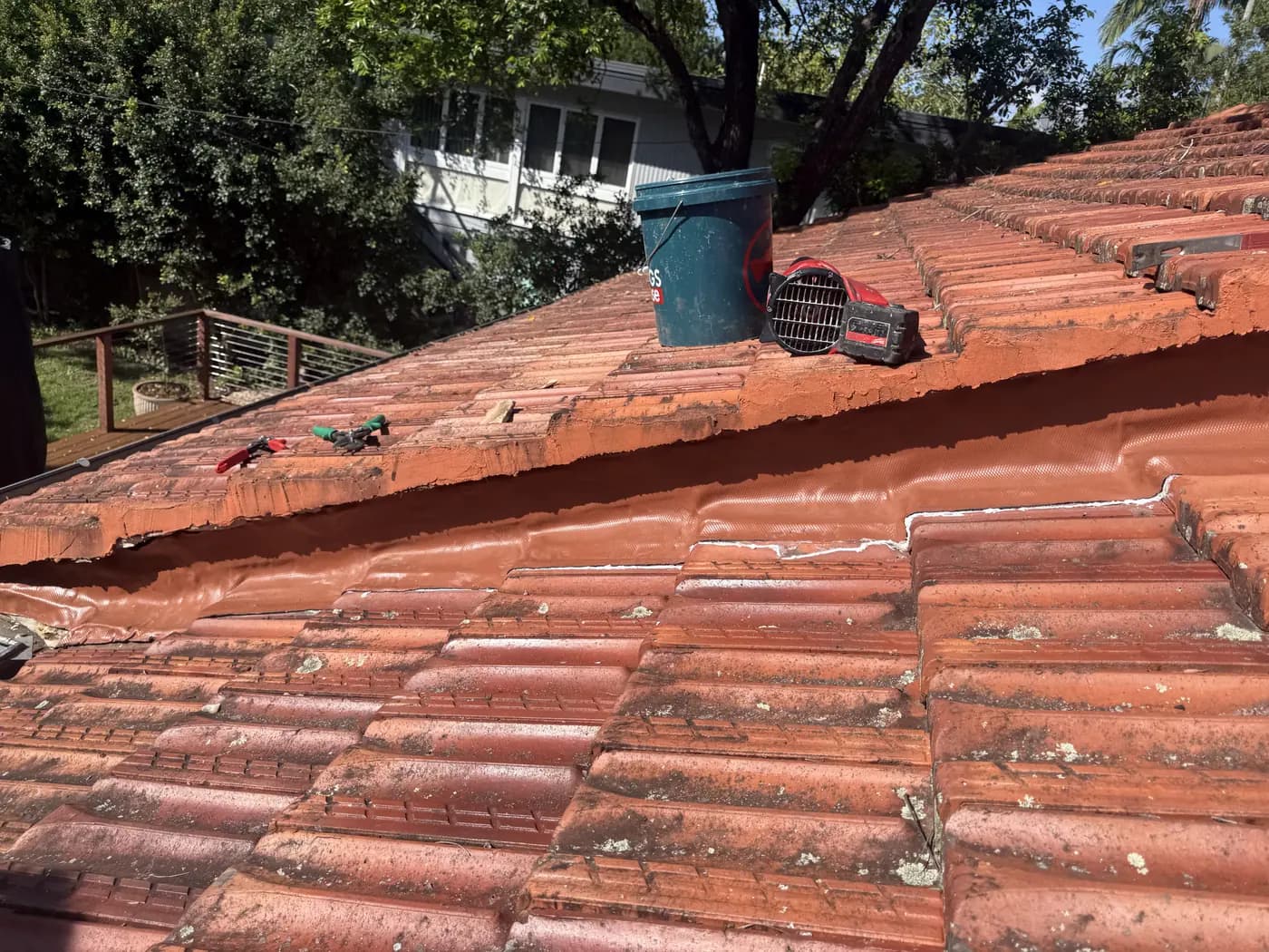 Ridge caps rebedded and repointed - after