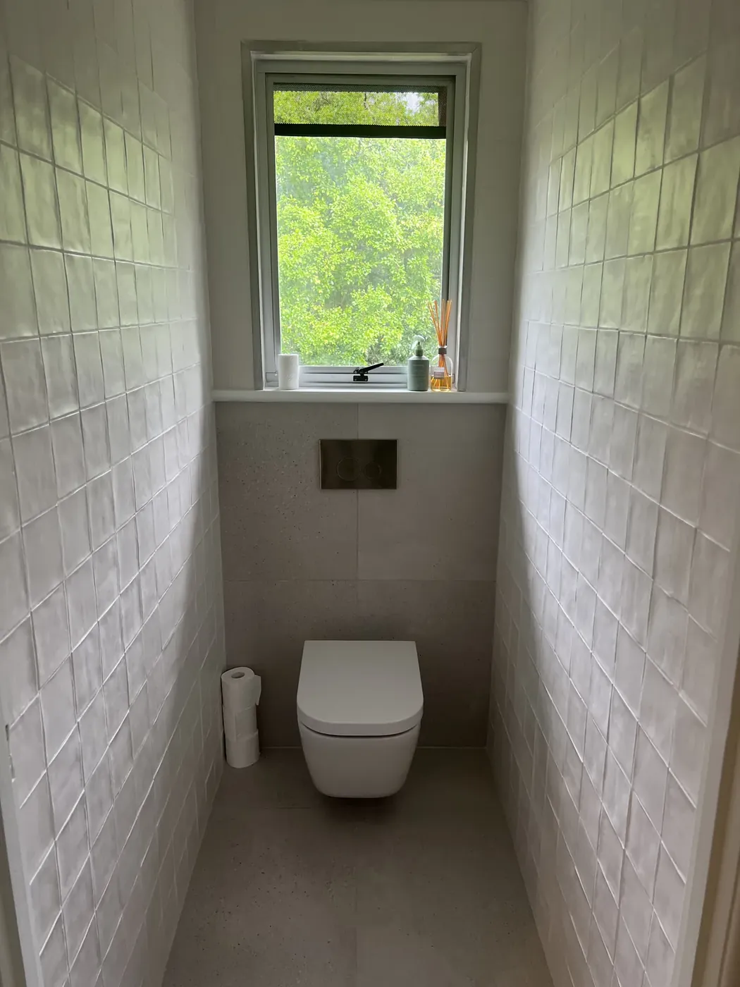 Wall-hung toilet in a full renovation - after